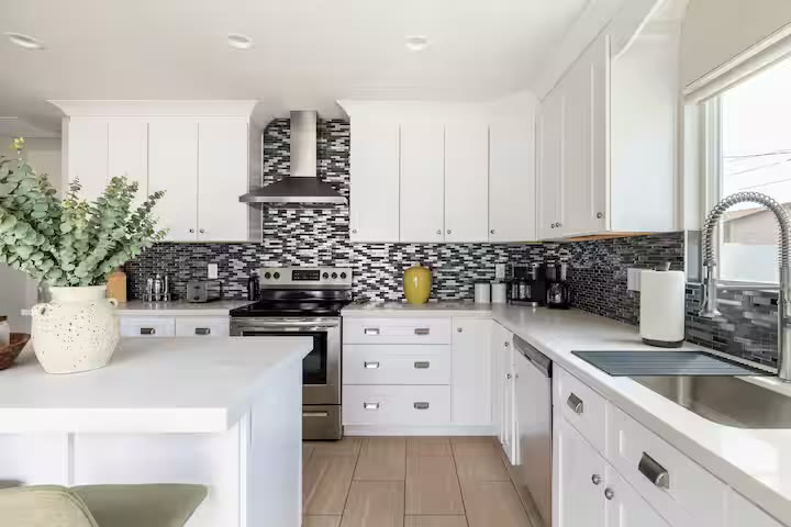 Stylish & Perfect for Families - Open Kitchen Stylish & Perfect for Families open kitchen at a direct-booking vacation rental in Phoenix, Arizona