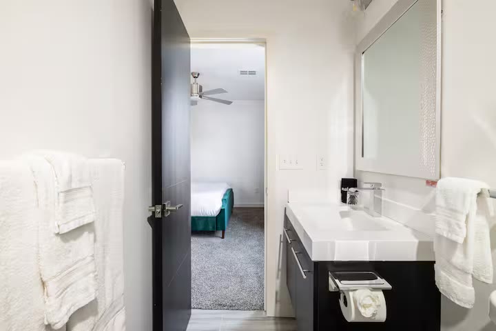 Modern All-En-Suite Home - En Suite Bathroom Modern All-En-Suite Home en-suite bathroom at a direct-booking vacation rental in Phoenix, Arizona