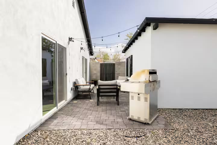 Modern All-En-Suite Home - Backyard Patio Modern All-En-Suite Home backyard patio at a direct-booking vacation rental in Phoenix, Arizona