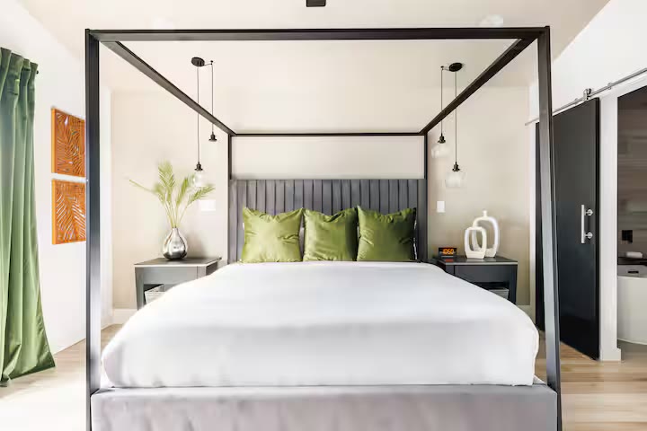 Modern All-En-Suite Home - Queen Bedroom Modern All-En-Suite Home queen bedroom at a direct-booking vacation rental in Phoenix, Arizona