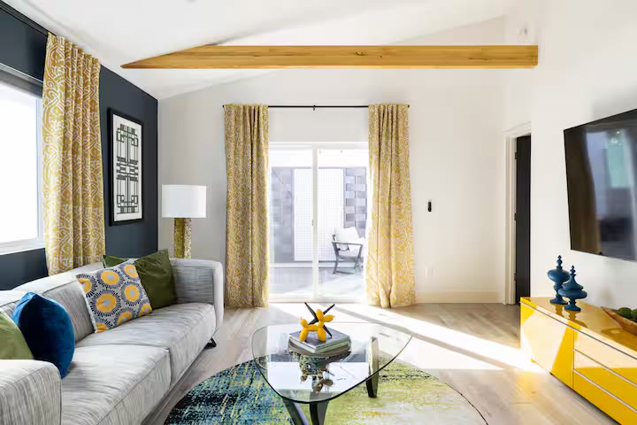 Modern All-En-Suite Home - Living Room Sofa Modern All-En-Suite Home living room sofa at a direct-booking vacation rental in Phoenix, Arizona