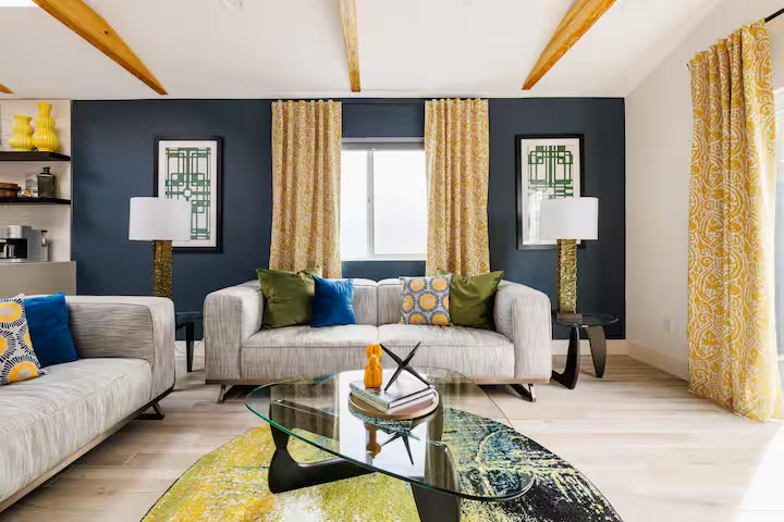 Modern All-En-Suite Home - Living Room Media Wall Modern All-En-Suite Home living room media wall at a direct-booking vacation rental in Phoenix, Arizona