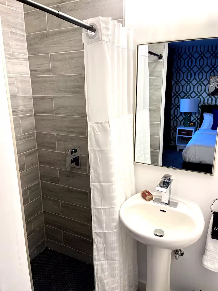 Modern All-En-Suite Home - Bathroom Tile Shower Modern All-En-Suite Home bathroom tile shower at a direct-booking vacation rental in Phoenix, Arizona