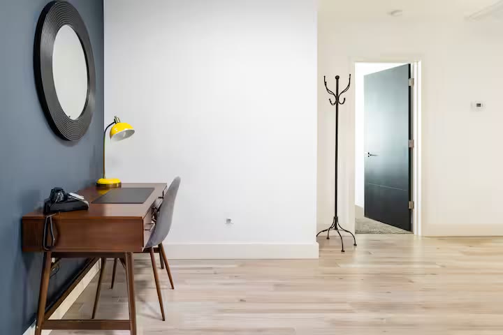 Modern All-En-Suite Home - Hallway Modern All-En-Suite Home hallway at a direct-booking vacation rental in Phoenix, Arizona