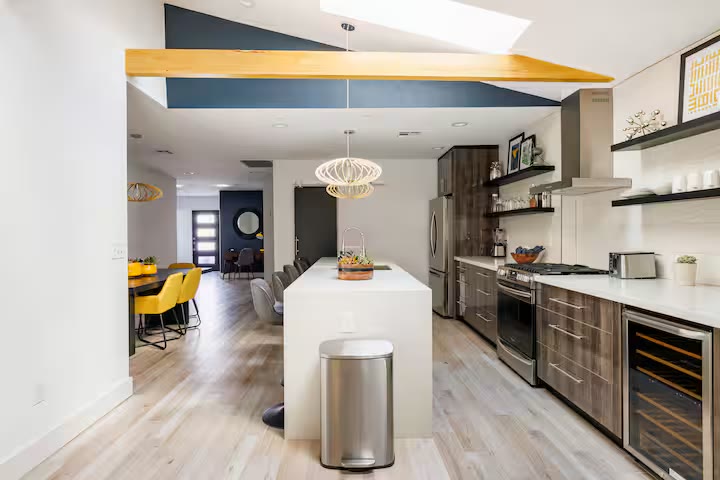 Modern All-En-Suite Home - Kitchen Island Modern All-En-Suite Home kitchen island at a direct-booking vacation rental in Phoenix, Arizona