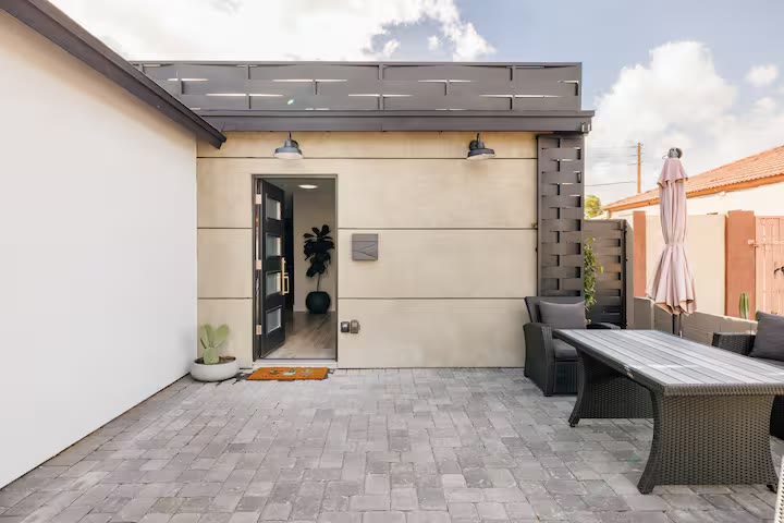 Modern All-En-Suite Home - Front Exterior Patio Modern All-En-Suite Home front exterior patio at a direct-booking vacation rental in Phoenix, Arizona