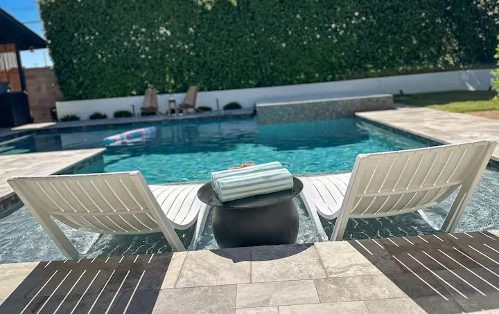 Palm Haven Pool House - Pool Lounge Seating Palm Haven Pool House pool lounge seating at a direct-booking vacation rental in Phoenix, Arizona