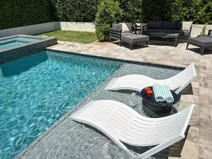 Palm Haven Pool House - Pool Lounge Chairs Palm Haven Pool House pool lounge chairs at a direct-booking vacation rental in Phoenix, Arizona