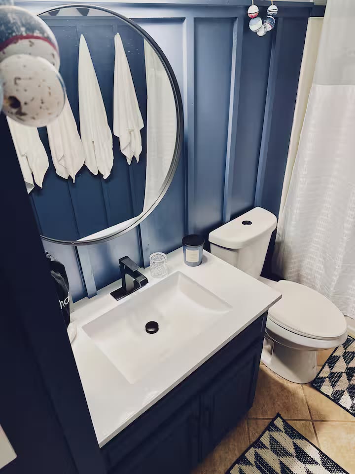 The Angler's Canoe Lake House - Bathroom Vanity The Angler's Canoe Lake House bathroom vanity at a direct-booking vacation rental in Cedar Bluff, Alabama