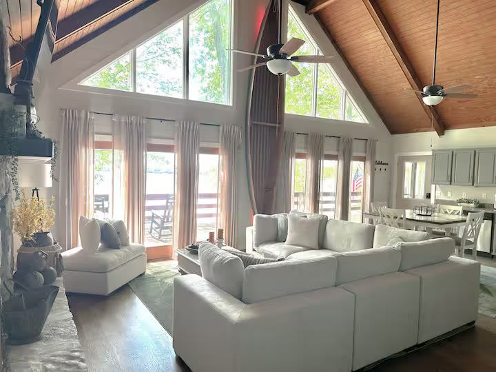 The Angler's Canoe Lake House - Living Room Seating The Angler's Canoe Lake House living room seating at a direct-booking vacation rental in Cedar Bluff, Alabama