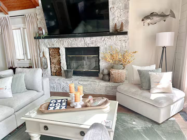 The Angler's Canoe Lake House - Living Room Seating The Angler's Canoe Lake House living room seating at a direct-booking vacation rental in Cedar Bluff, Alabama
