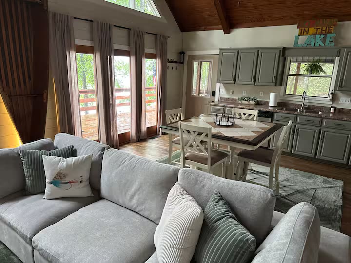 The Angler's Canoe Lake House - Open Living Room The Angler's Canoe Lake House open living room at a direct-booking vacation rental in Cedar Bluff, Alabama