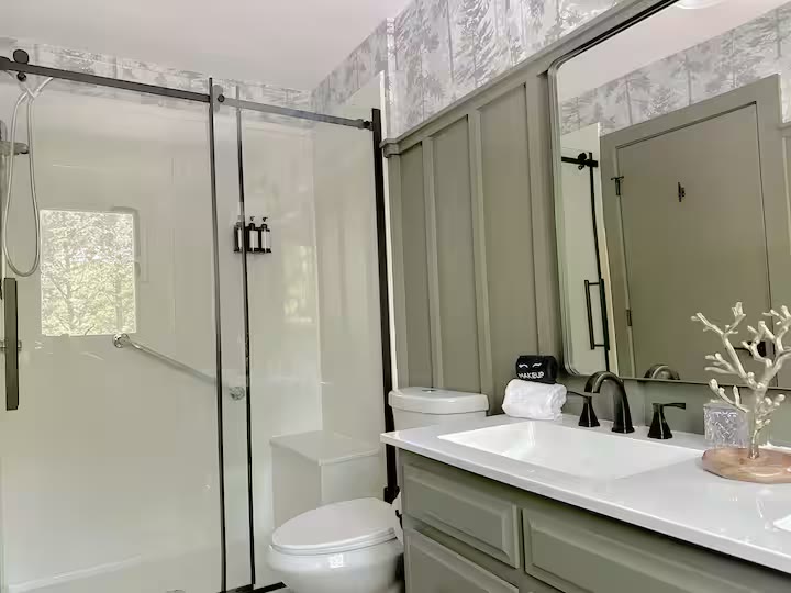 The Angler's Canoe Lake House - Bathroom Vanity The Angler's Canoe Lake House bathroom vanity at a direct-booking vacation rental in Cedar Bluff, Alabama