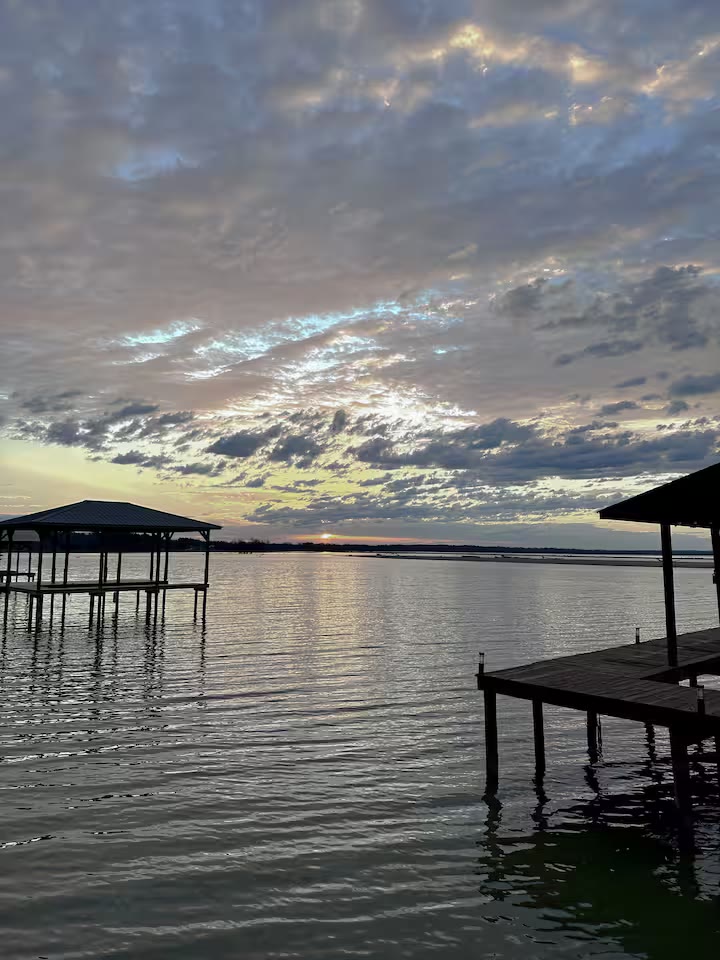 The Angler's Canoe Lake House - Lakefront Seating The Angler's Canoe Lake House lakefront seating at a direct-booking vacation rental in Cedar Bluff, Alabama