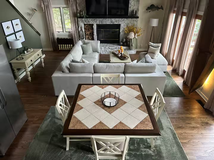 The Angler's Canoe Lake House - Living Room Sofa The Angler's Canoe Lake House living room sofa at a direct-booking vacation rental in Cedar Bluff, Alabama
